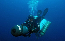 Tec Diver with scooter on way up..... by Andy Kutsch 